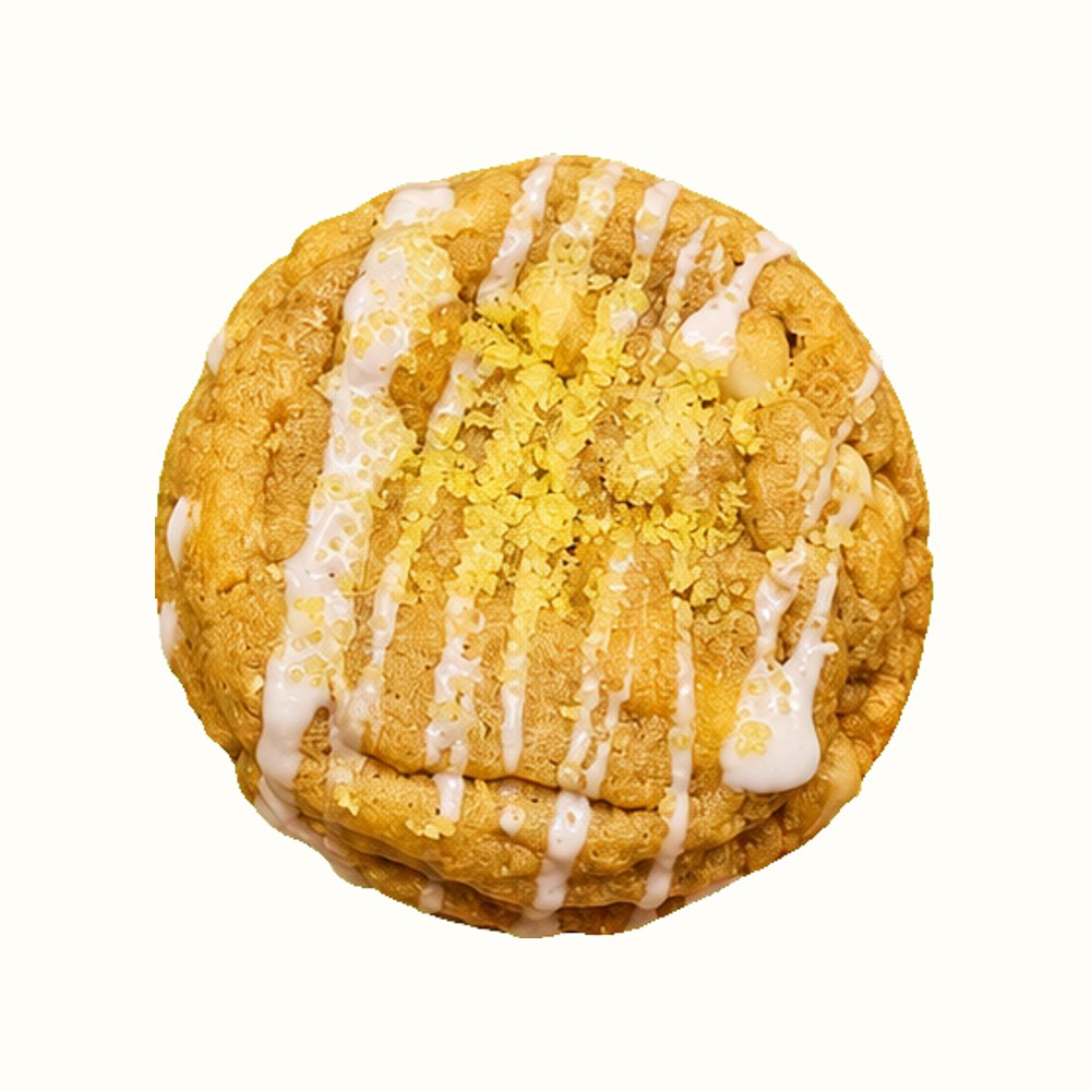 A lemon cookie with vanilla drizzle